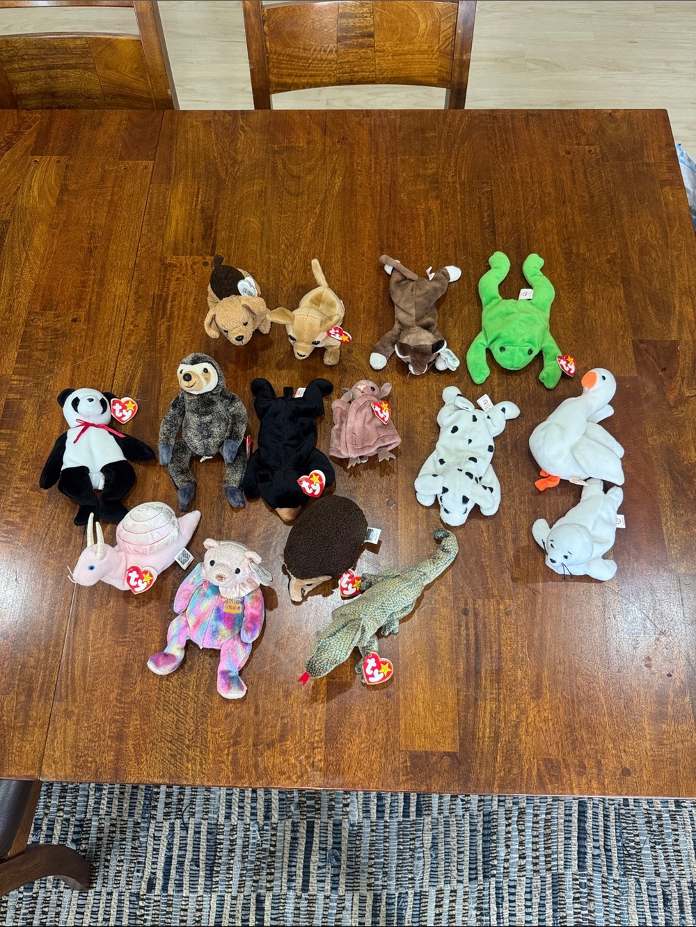 Lot of 15 Beanie Babies. All but 3 have their original Ty red heart tags still